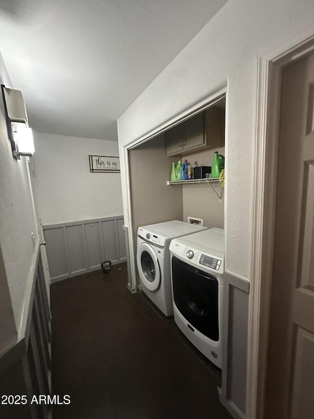 clothes washing area featuring independent washer and dryer