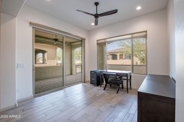 interior space with light wood-style floors, ceiling fan, and recessed lighting