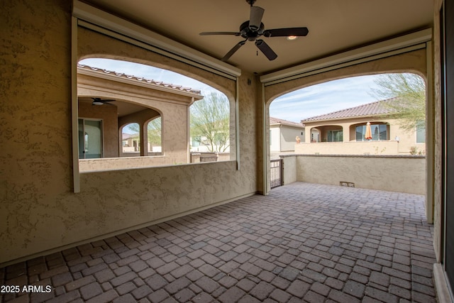 view of patio / terrace featuring a ceiling fan