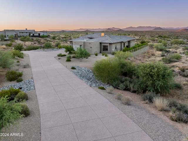 view of front of home with a mountain view