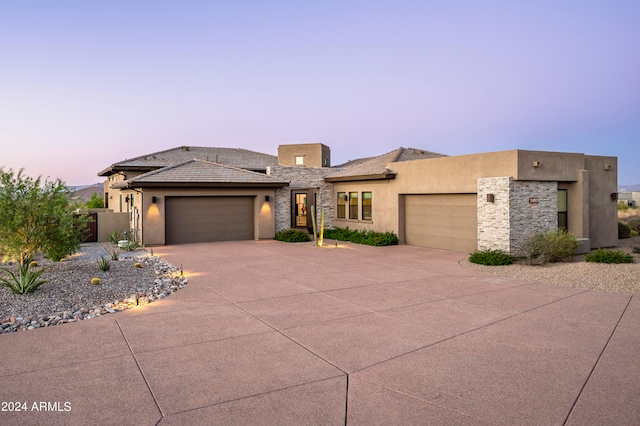 view of front of property with a garage