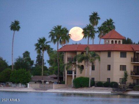 view of pool at dusk