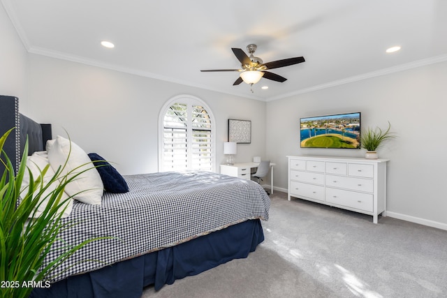 bedroom featuring crown molding, light colored carpet, and ceiling fan