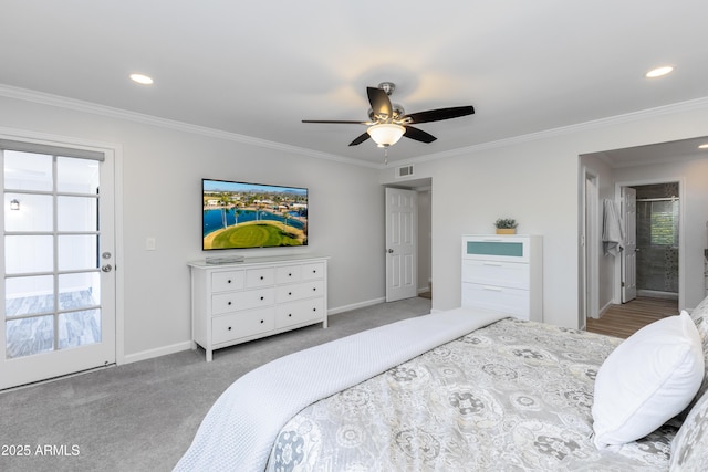 carpeted bedroom with ornamental molding and ceiling fan