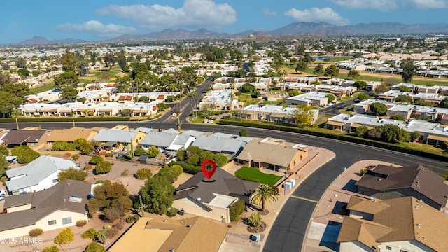 drone / aerial view featuring a mountain view