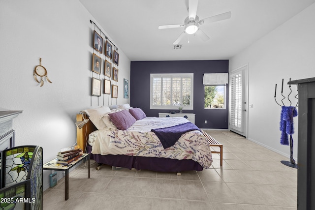 tiled bedroom with ceiling fan