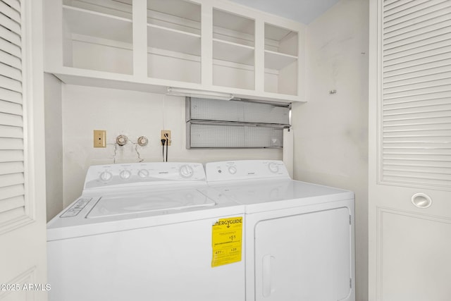 laundry room featuring laundry area and washing machine and clothes dryer