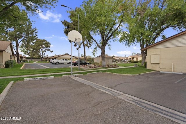 view of road with street lighting and a residential view