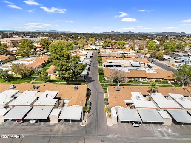 bird's eye view with a residential view and a mountain view