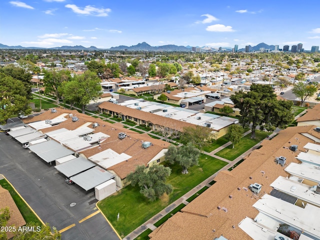 drone / aerial view with a residential view and a mountain view