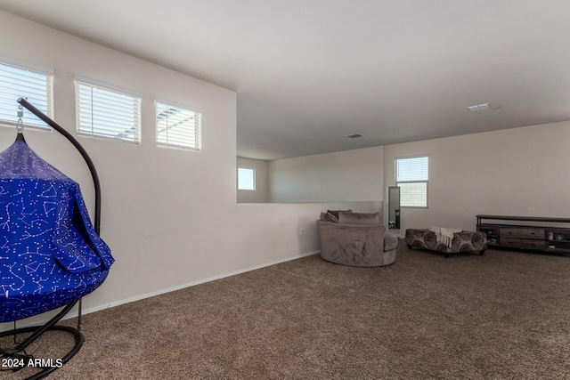 sitting room with carpet flooring