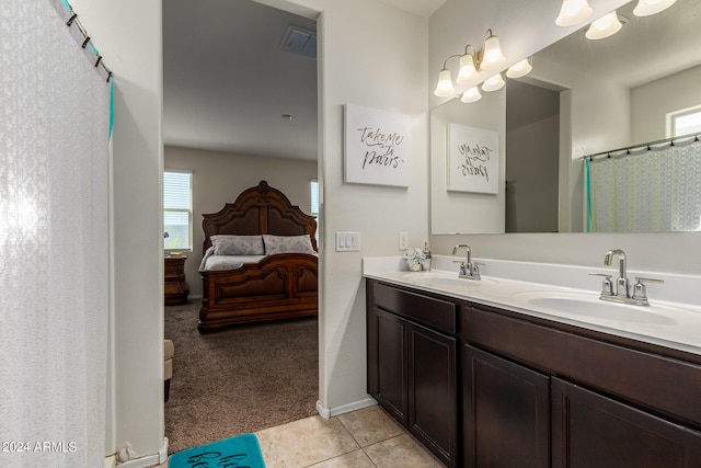 bathroom featuring vanity and tile patterned flooring