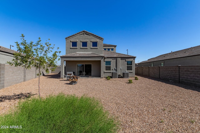 back of house featuring a patio and central AC unit