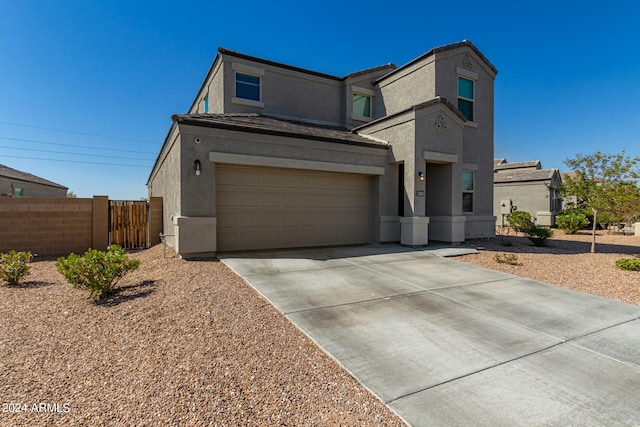 view of front of property with a garage