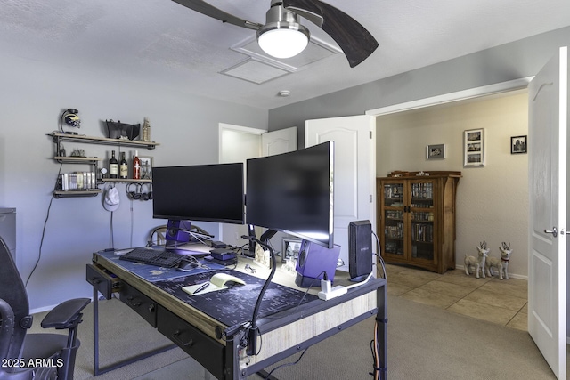 office with ceiling fan and light tile patterned floors