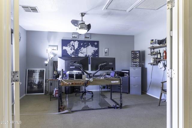 office area featuring visible vents and baseboards