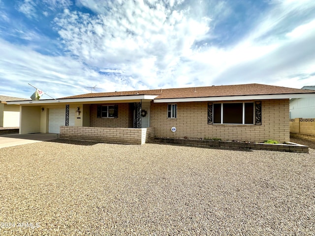 ranch-style house with a garage