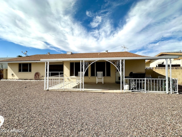 rear view of house with a patio area