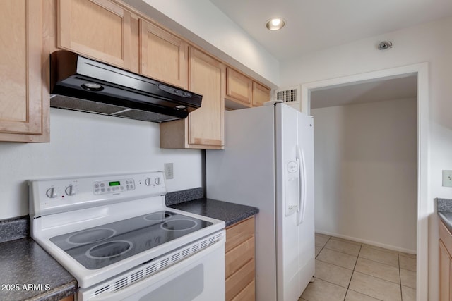 kitchen featuring extractor fan, white appliances, light brown cabinetry, and light tile patterned floors