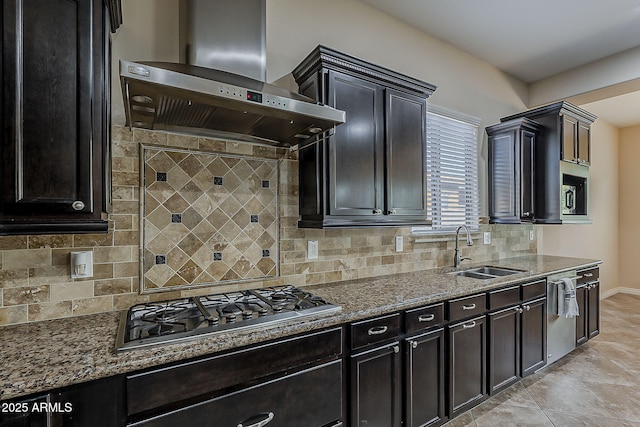3925 E Elmwood St, Mesa, AZ 85205 - kitchen featuring wall chimney exhaust hood, appliances with stainless steel finishes, stone counters, and decorative backsplash