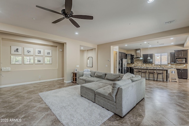 3925 E Elmwood St, Mesa, AZ 85205 - living area with ceiling fan and recessed lighting