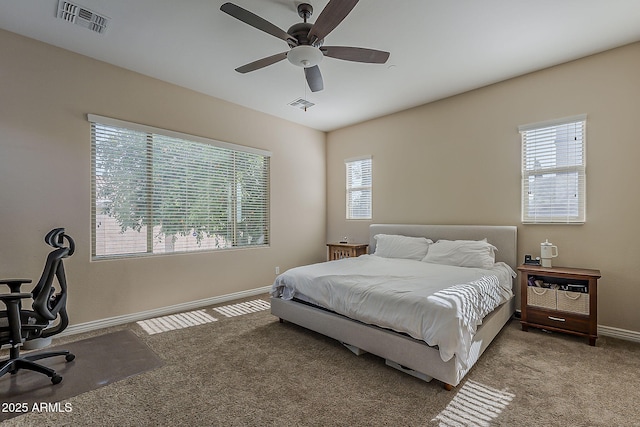 3925 E Elmwood St, Mesa, AZ 85205 - carpeted bedroom with multiple windows and a ceiling fan