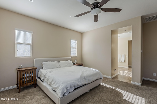 3925 E Elmwood St, Mesa, AZ 85205 - carpeted bedroom featuring multiple windows and ceiling fan