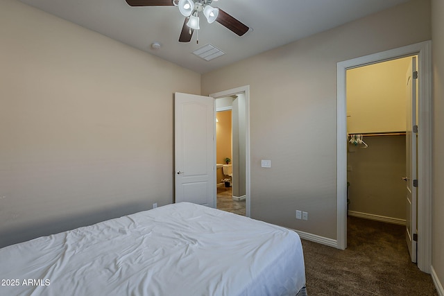 3925 E Elmwood St, Mesa, AZ 85205 - carpeted bedroom featuring a spacious closet and ceiling fan
