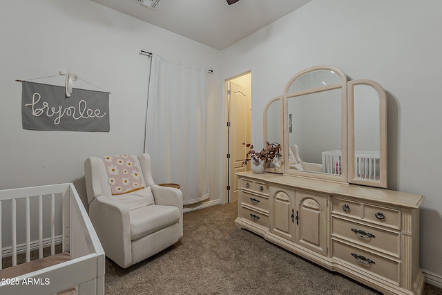 3925 E Elmwood St, Mesa, AZ 85205 - bedroom with dark carpet and a nursery area