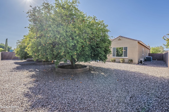 3925 E Elmwood St, Mesa, AZ 85205 - back of house featuring a fenced backyard and stucco siding