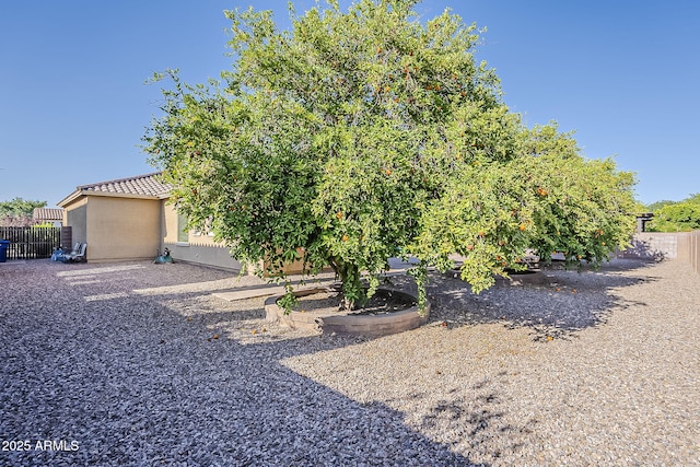 3925 E Elmwood St, Mesa, AZ 85205 - view of front of house featuring a tile roof and stucco siding