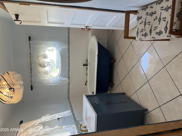 interior space featuring tile walls