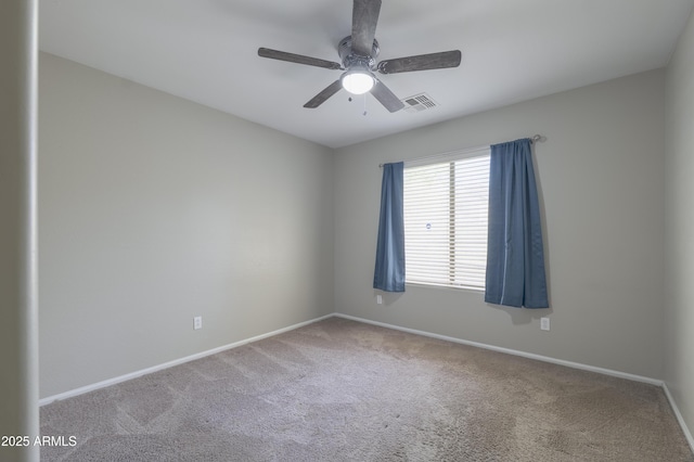 41388 W Hopper Dr, Maricopa, AZ 85138 - empty room featuring carpet floors, baseboards, and ceiling fan