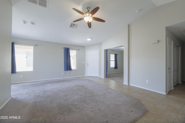 41388 W Hopper Dr, Maricopa, AZ 85138 - tiled empty room with lofted ceiling, a ceiling fan, and baseboards