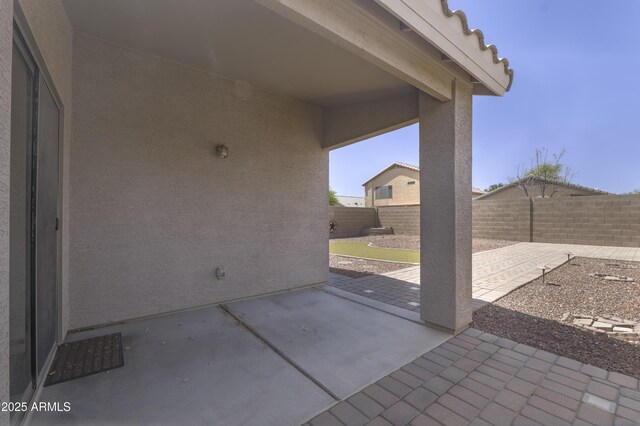 41388 W Hopper Dr, Maricopa, AZ 85138 - view of patio featuring a fenced backyard