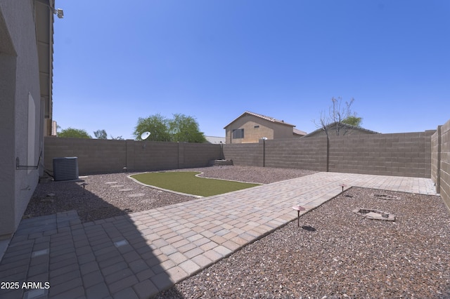 41388 W Hopper Dr, Maricopa, AZ 85138 - view of patio / terrace with central air condition unit and a fenced backyard