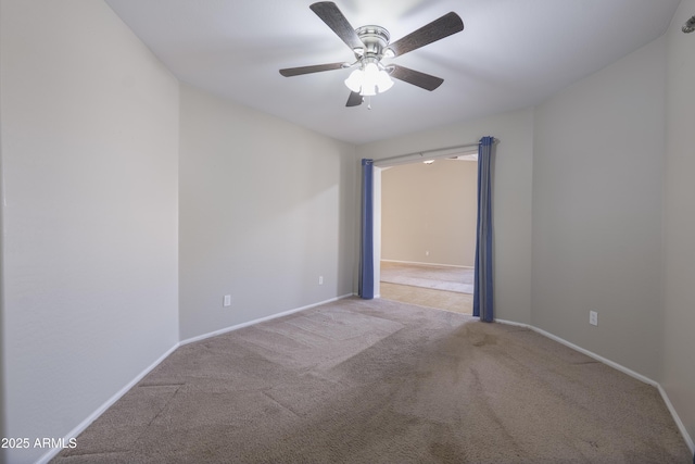 41388 W Hopper Dr, Maricopa, AZ 85138 - empty room with carpet floors, ceiling fan, and baseboards
