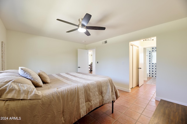 bedroom featuring ceiling fan and light tile patterned floors