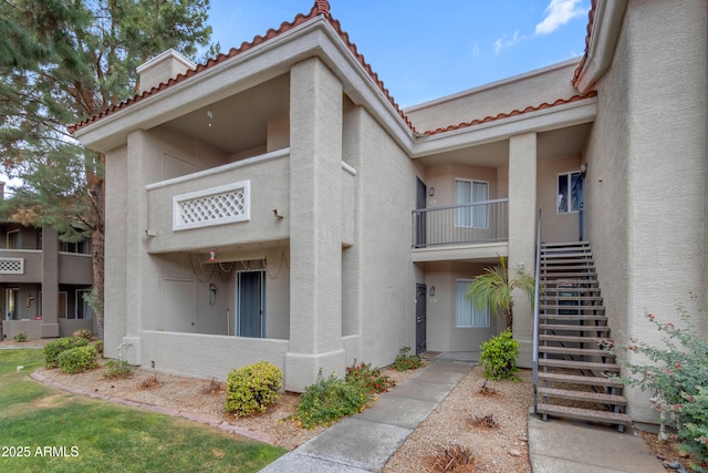 2929 W Yorkshire Dr Unit 2013, Phoenix, AZ 85027 - view of building exterior with stairs