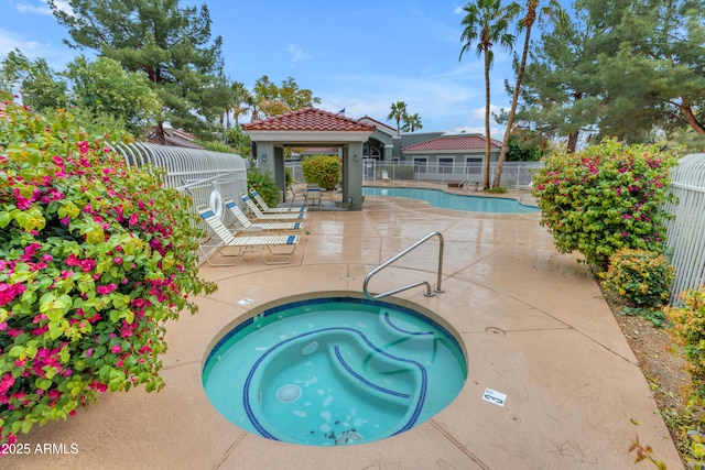 2929 W Yorkshire Dr Unit 2013, Phoenix, AZ 85027 - community pool with a hot tub, fence, a patio, and a gazebo
