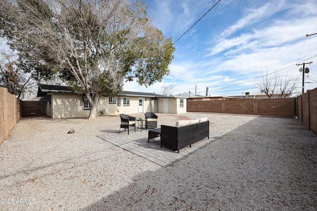 view of yard with outdoor lounge area and a patio