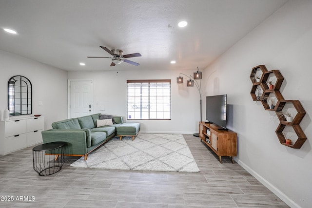 living room featuring ceiling fan