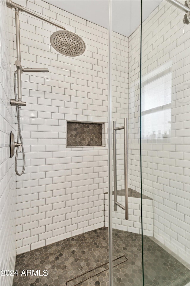 bathroom featuring walk in shower