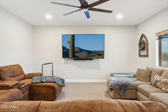 living room with light carpet and ceiling fan