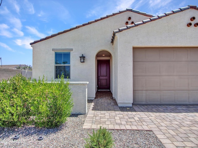15817 S 177th Dr, Goodyear, AZ 85338 - mediterranean / spanish house featuring stucco siding and an attached garage