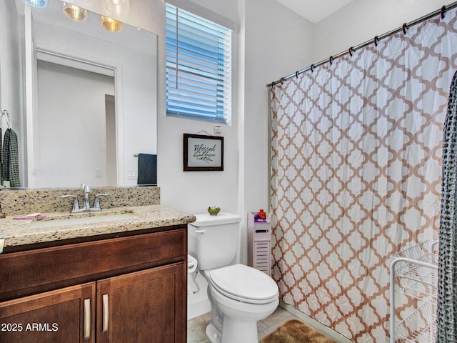 15817 S 177th Dr, Goodyear, AZ 85338 - bathroom featuring toilet, vanity, tile patterned floors, and curtained shower