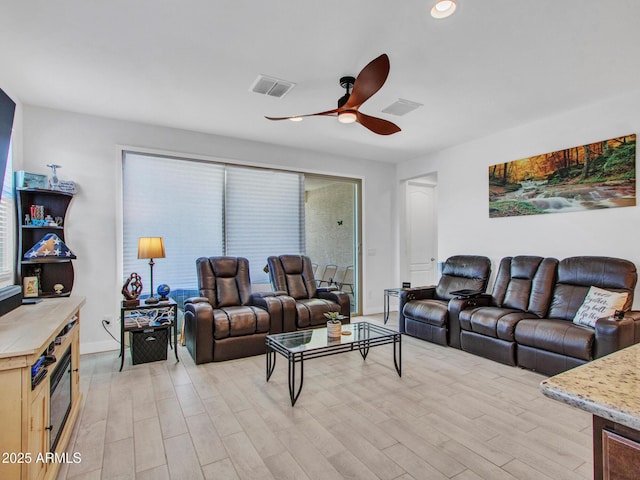15817 S 177th Dr, Goodyear, AZ 85338 - living room with a ceiling fan, light wood-style floors, recessed lighting, and baseboards