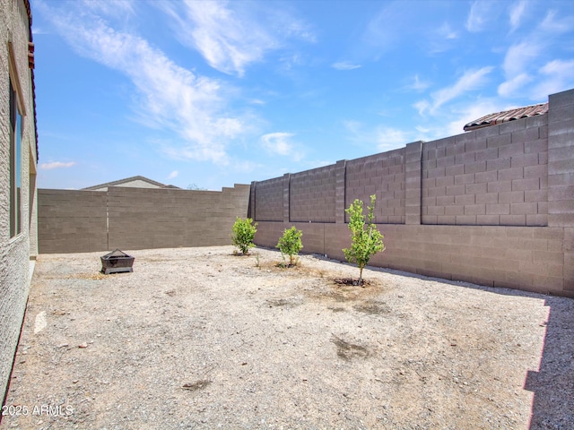 15817 S 177th Dr, Goodyear, AZ 85338 - fenced backyard featuring a fire pit