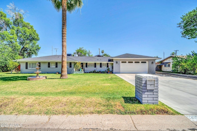 1208 E Tuckey Ln, Phoenix, AZ 85014 - ranch-style home featuring concrete driveway, an attached garage, and a front lawn