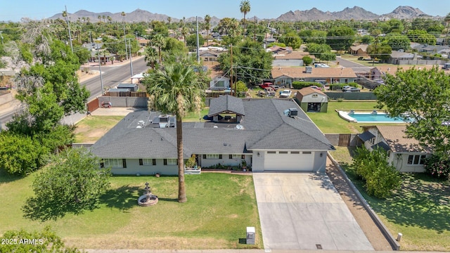 1208 E Tuckey Ln, Phoenix, AZ 85014 - aerial perspective of suburban area featuring a mountainous background
